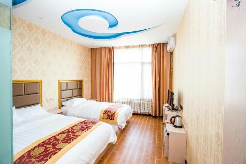 Imagen de la habitación del Harbin Airport Daily Inn. Foto 6
