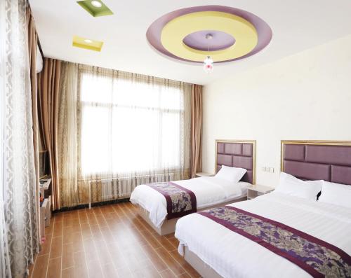 Imagen de la habitación del Harbin Airport Daily Inn. Foto 7