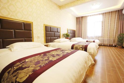 Imagen de la habitación del Harbin Airport Daily Inn. Foto 9