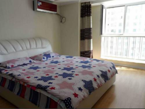 Imagen de la habitación del Harbin Haxi Wanda Seven Star Aparment. Foto 5