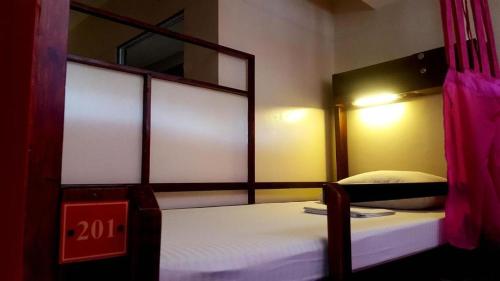 Imagen de la habitación del Harimariz Dormitory Hotel Official. Foto 18