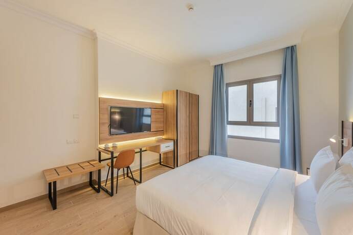 Imagen de la habitación del Hasana Suites. Foto 18