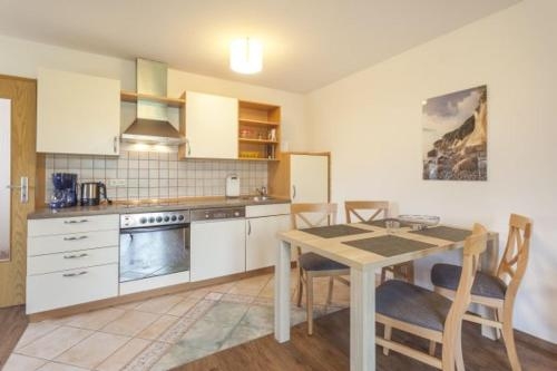 Imagen de la habitación del Haus An Der Düne - Ferienwohnungen Ca.100m Zum Str. Foto 6