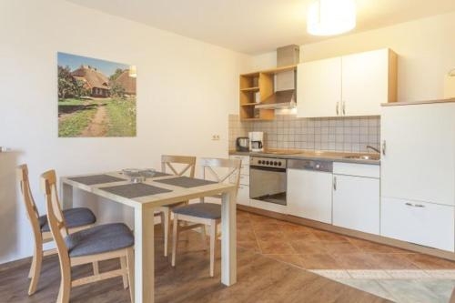 Imagen de la habitación del Haus An Der Düne - Ferienwohnungen Ca.100m Zum Str. Foto 7