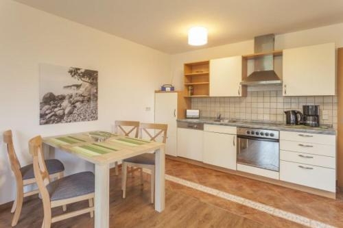 Imagen de la habitación del Haus An Der Düne - Ferienwohnungen Ca.100m Zum Str. Foto 10