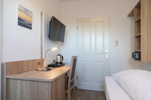 Imagen de la habitación del Heeren\'s Hotel Garni. Foto 18