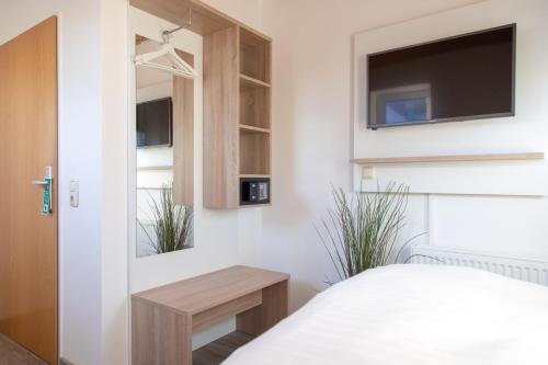 Imagen de la habitación del Heeren\'s Hotel Garni. Foto 19