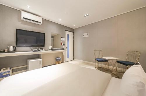 Imagen de la habitación del Heimish Hotel. Foto 12