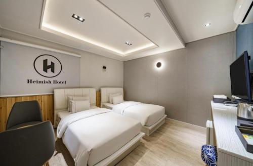 Imagen de la habitación del Heimish Hotel. Foto 14