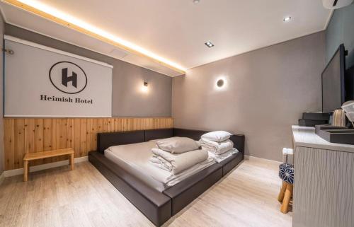 Imagen de la habitación del Heimish Hotel. Foto 15