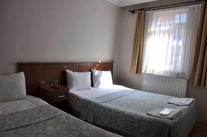 Imagen de la habitación del Hekimoglu Otel. Foto 6