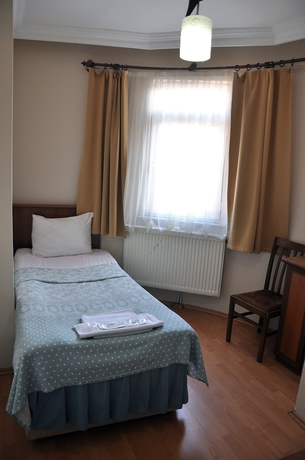 Imagen de la habitación del Hekimoglu Otel. Foto 14