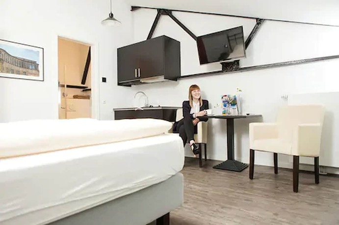 Imagen de la habitación del Heldts Apartment-Hotel. Foto 17