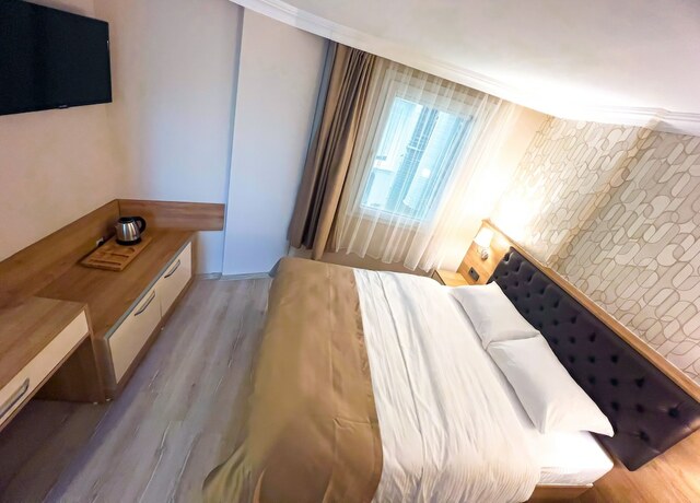Imagen de la habitación del Helen Inn. Foto 17