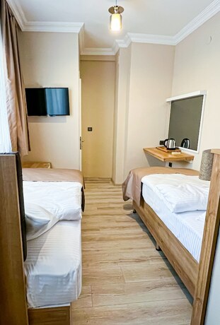 Imagen de la habitación del Helen Inn. Foto 18