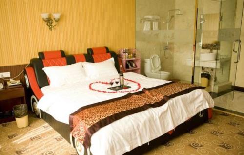 Imagen de la habitación del Hemei Business Hotel. Foto 7