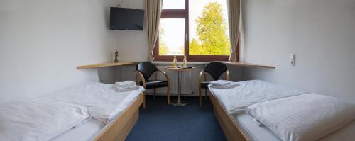 Imagen de la habitación del Hermann Neuberger Sportschule. Foto 17