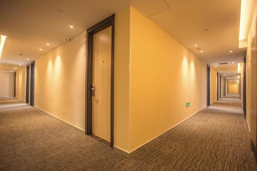 Imagen de la habitación del Hi Inn Tianjin Technique Plaza. Foto 6