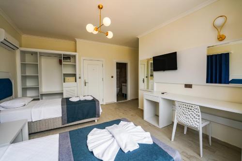 Imagen de la habitación del Hisaronu Oludeniz Cozy Hotel. Foto 20