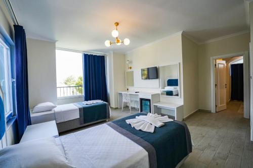Imagen general del Hisaronu Oludeniz Cozy Hotel. Foto 8