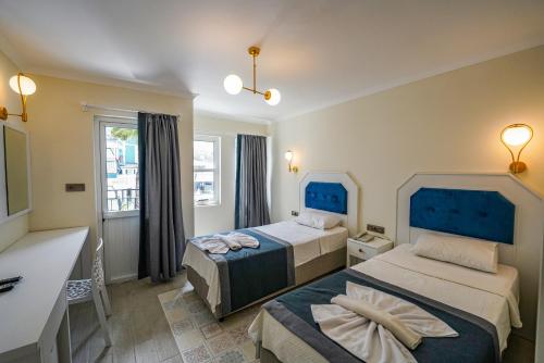 Imagen general del Hisaronu Oludeniz Cozy Hotel. Foto 12
