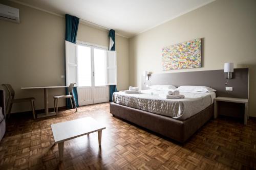 Imagen de la habitación del Historico Loft & Rooms Palazzo Adragna XIX. Foto 6