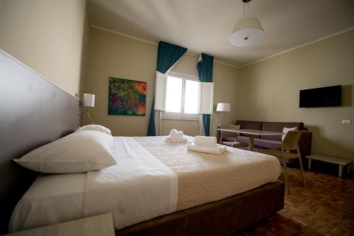 Imagen de la habitación del Historico Loft & Rooms Palazzo Adragna XIX. Foto 8