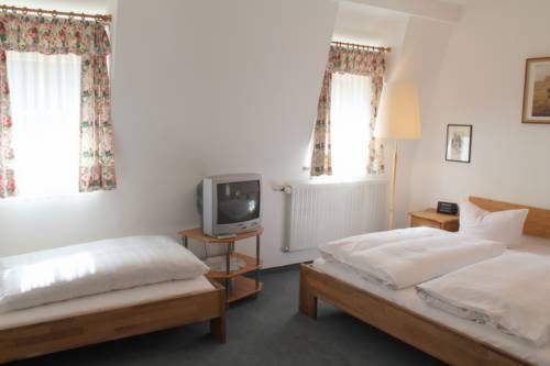 Imagen de la habitación del Hocher Hotel. Foto 14