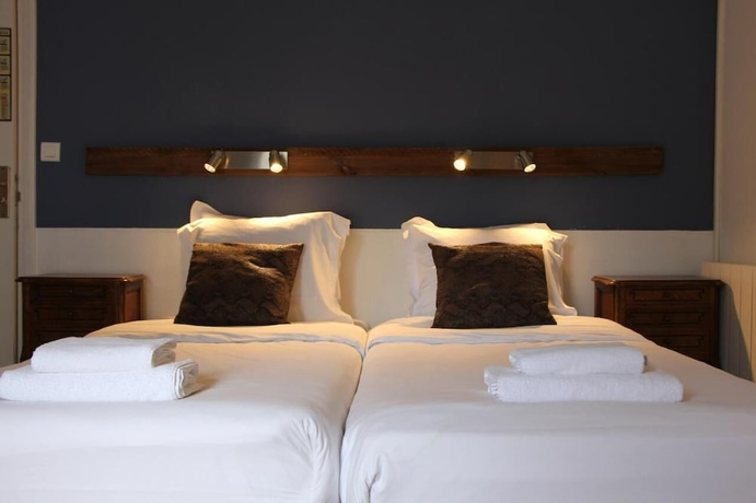 Imagen de la habitación del H&ocirc;tel Au Grand Duquesne. Foto 5