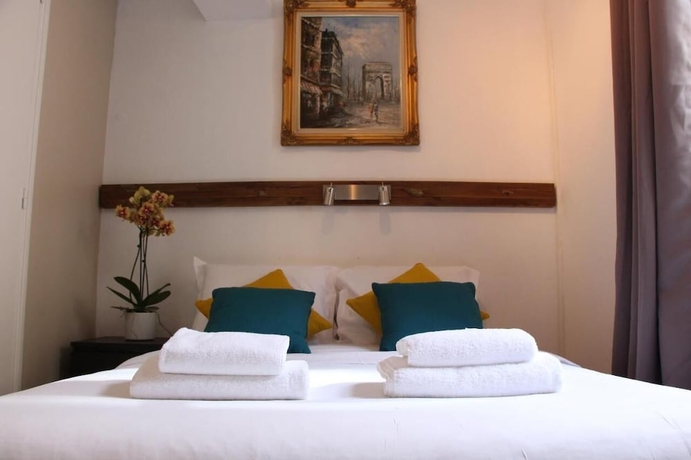 Imagen de la habitación del H&ocirc;tel Au Grand Duquesne. Foto 9