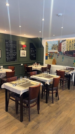 Imagen del bar/restaurante del H&ocirc;tel Au Grand Duquesne. Foto 2