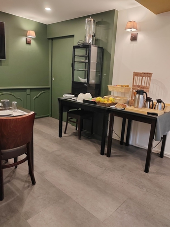 Imagen del bar/restaurante del H&ocirc;tel Au Grand Duquesne. Foto 3