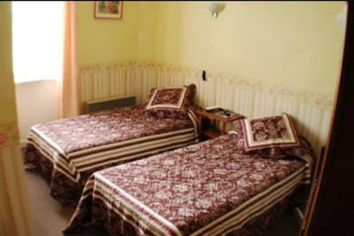 Imagen de la habitación del H&ocirc;tel Au jardin St Michel. Foto 7