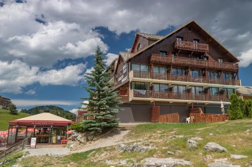 Imagen de la habitación del H&ocirc;tel Club Chalet Margot. Foto 7