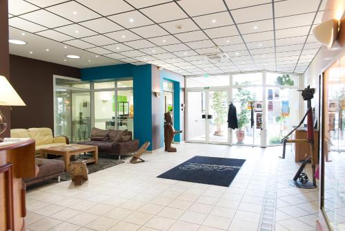 Imagen de la habitación del H&ocirc;tel De France, Montmorillon. Foto 8