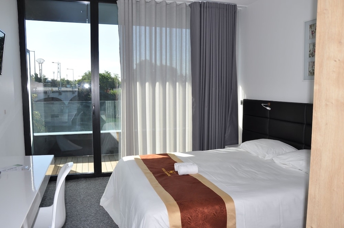 Imagen de la habitación del H&ocirc;tel De La Seine, &Eacute;pinay sur Seine. Foto 2