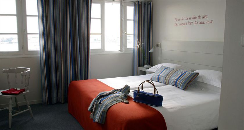 Imagen de la habitación del Hôtel Du Centre Chez Janie. Foto 8