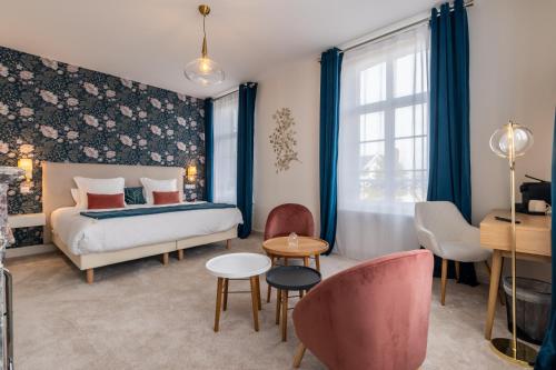 Imagen de la habitación del H&ocirc;tel &Eacute;chapp&eacute;e en Baie - Chambres climatis&eacute;es -Parking priv&eacute; gratuit dont forfaits bornes &eacute;lectrique. Foto 12
