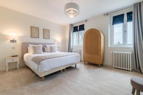 Imagen de la habitación del H&ocirc;tel &Eacute;chapp&eacute;e en Baie - Chambres climatis&eacute;es -Parking priv&eacute; gratuit dont forfaits bornes &eacute;lectrique. Foto 19