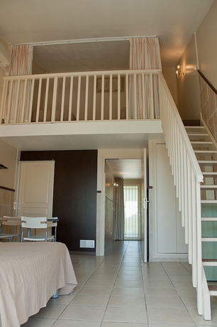 Imagen de la habitación del Hôtel Et Studios Les Amandiers. Foto 2