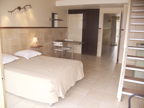 Imagen de la habitación del Hôtel Et Studios Les Amandiers. Foto 3