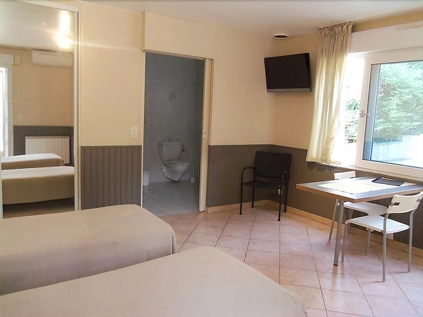 Imagen de la habitación del Hôtel Et Studios Les Amandiers. Foto 6