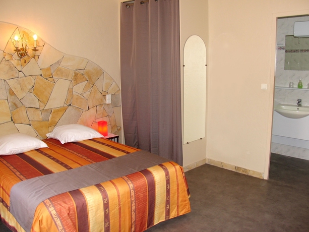 Imagen de la habitación del Hôtel Et Studios Les Amandiers. Foto 7