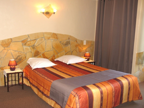 Imagen de la habitación del Hôtel Et Studios Les Amandiers. Foto 8