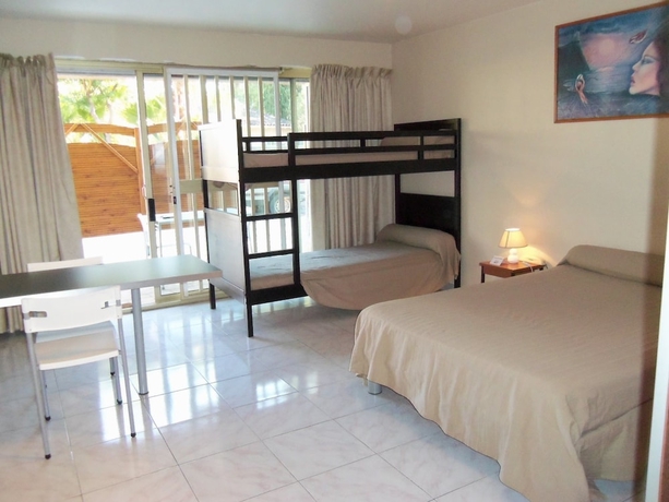 Imagen de la habitación del Hôtel Et Studios Les Amandiers. Foto 11