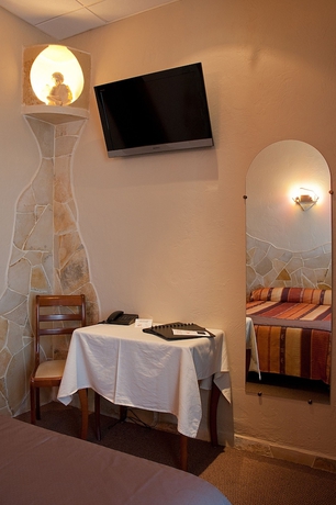 Imagen de la habitación del Hôtel Et Studios Les Amandiers. Foto 13