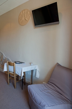 Imagen de la habitación del Hôtel Et Studios Les Amandiers. Foto 15