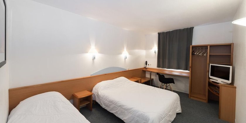 Imagen de la habitación del H&ocirc;tel First. Foto 7