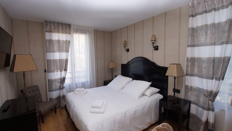 Imagen de la habitación del H&ocirc;tel L\'Or&eacute;e du Parc. Foto 8