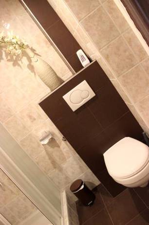 Imagen de la habitación del H&ocirc;tel La Maison Rouge. Foto 3